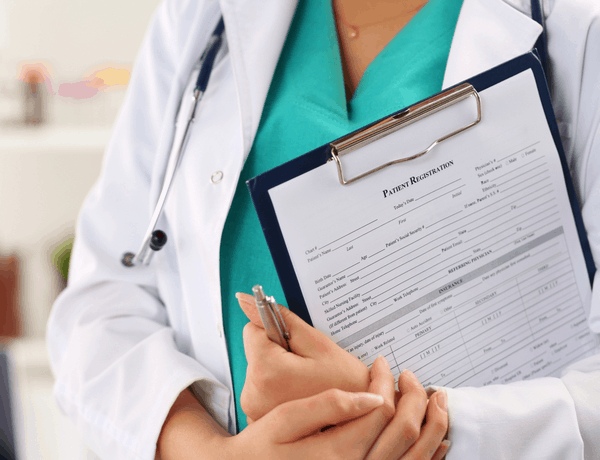 Gastroenterologist medical staff clipboard new patient forms